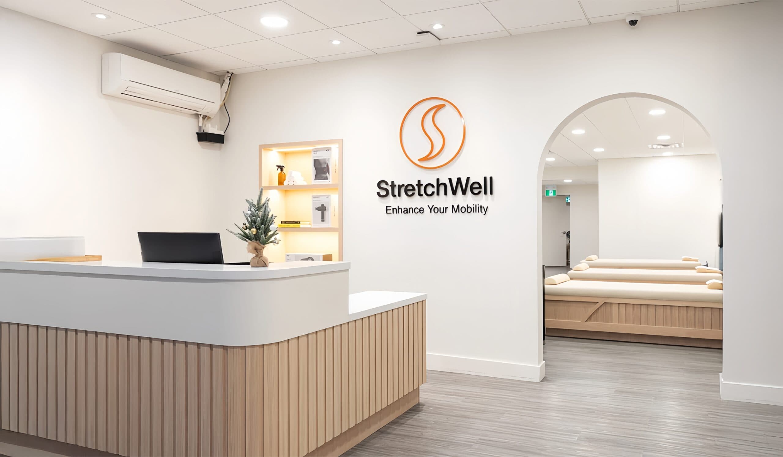 The reception desk and stretch room at StretchWell Rosedale